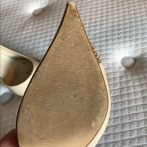 Bone and brown snake shoes